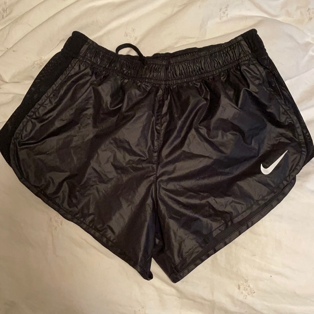 Nike running shorts. Black shiny shorts